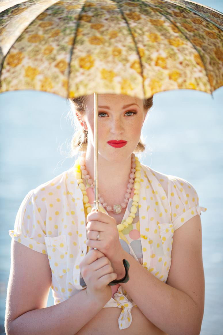 bride on her honeymoon holding umbrella Calgary wedding portfolio Tara Whittaker