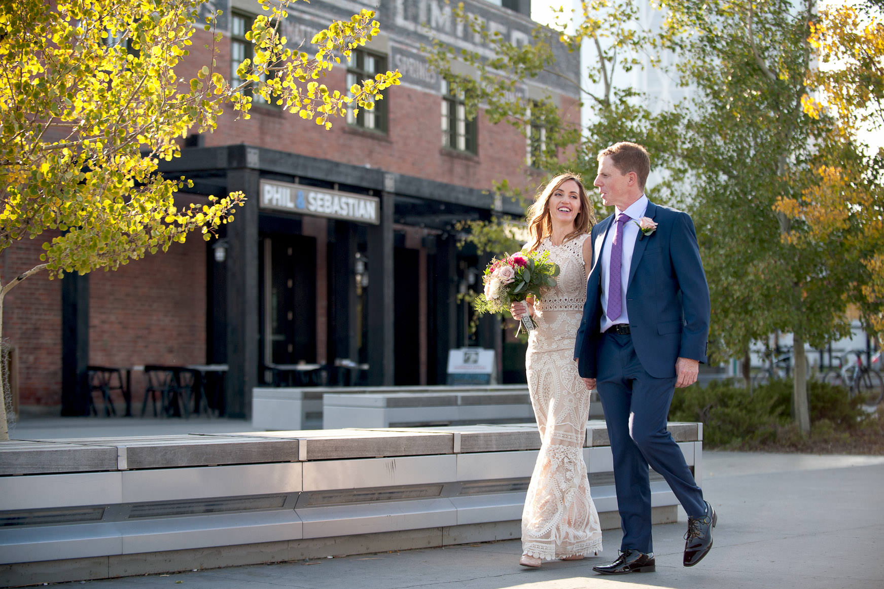 bride and groom outside Charbar one of the best wedding venues in Calgary and the Rockies