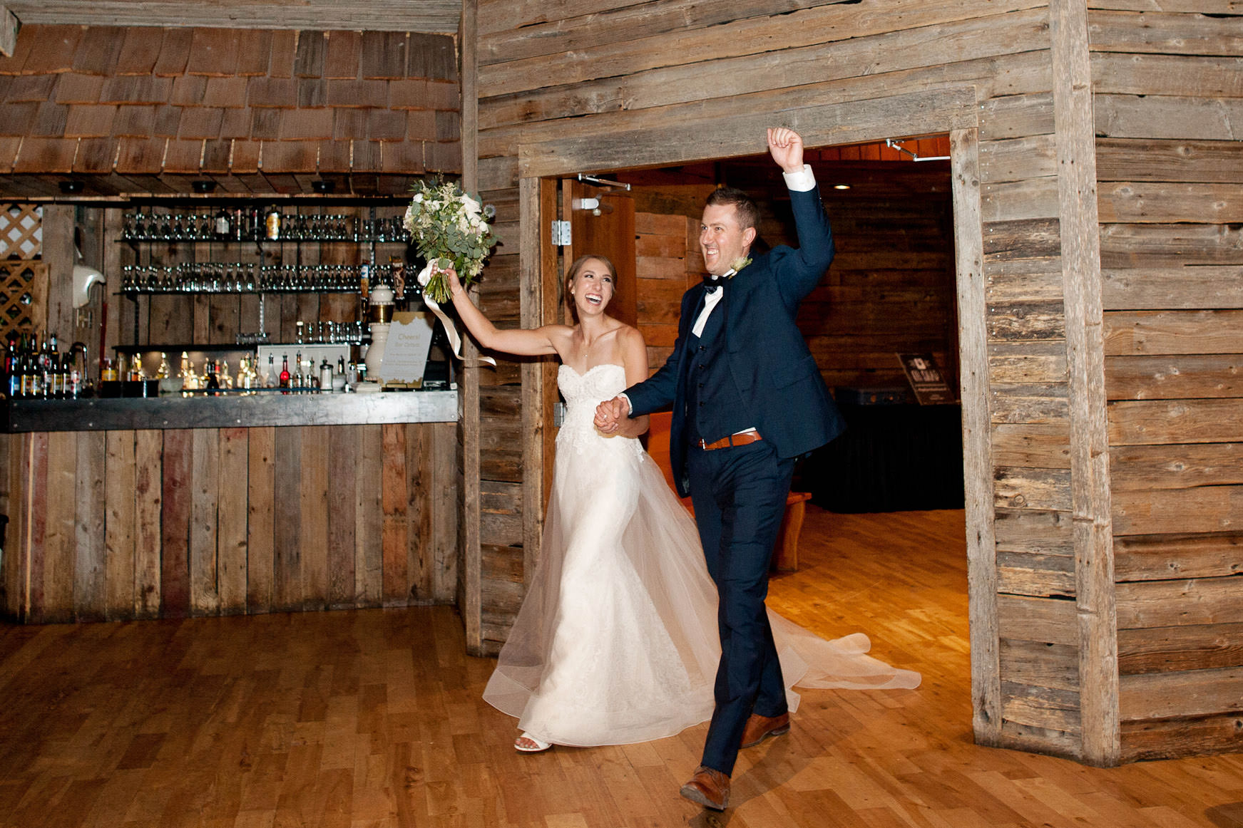 Bride and groom make their grand entrance at Cornerstone in Canmore