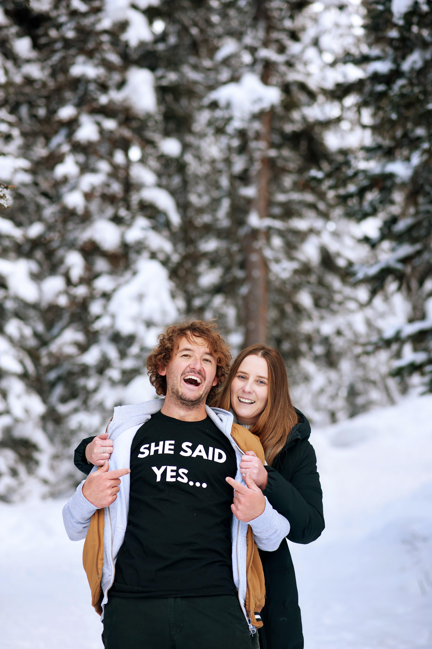 Groom wears "she said yes" t-shirt after Lake Louise proposal captured by Tara Whittaker Photography