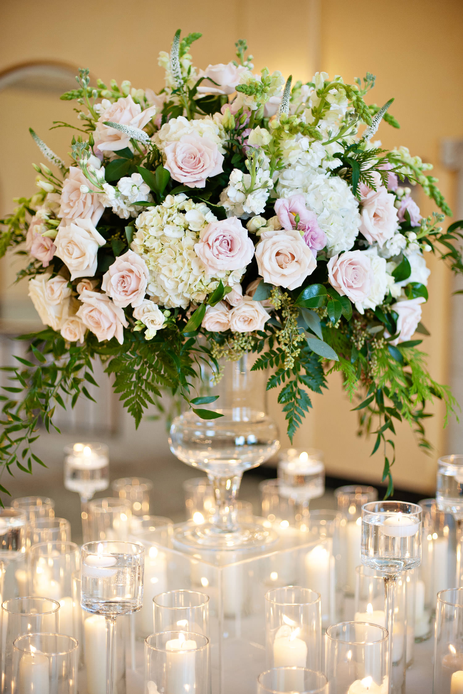 Floral centrepiece at destination wedding at the Fairmont Banff Springs Hotel captured by Tara Whittaker Photography