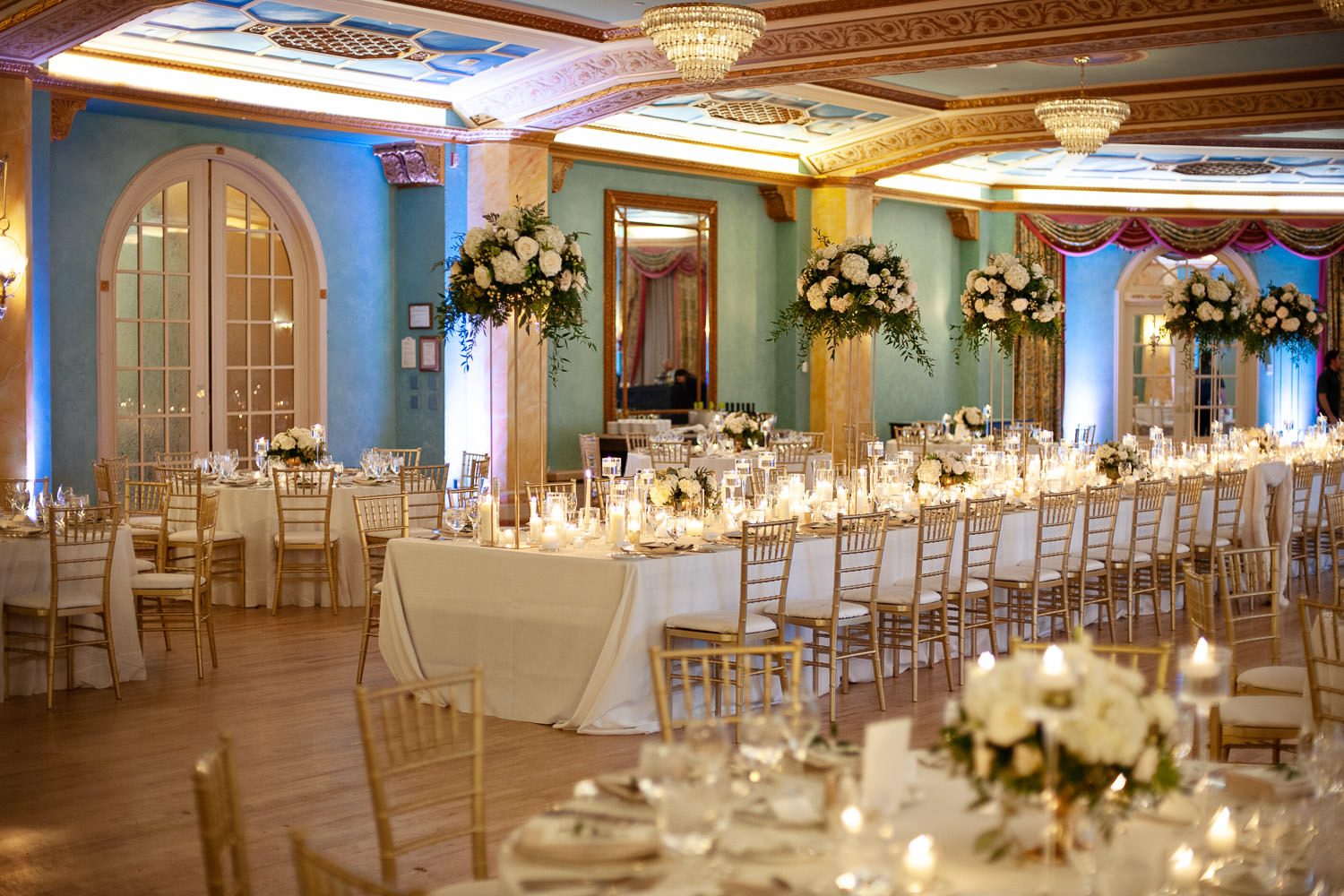 Candlelit reception in the Cascade Ballroom at the Banff Springs Hotel captured by Tara Whittaker Photography