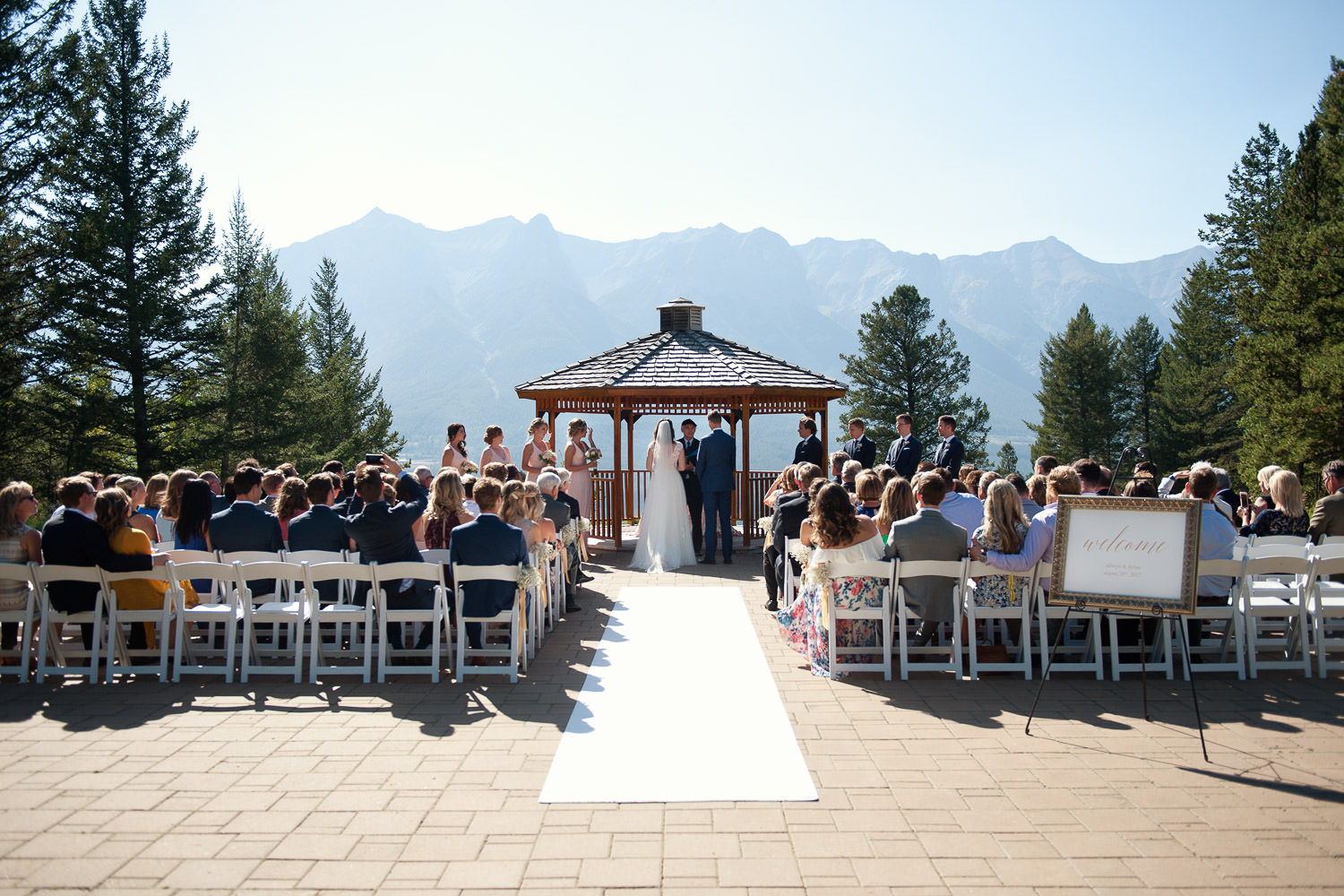 Wedding ceremony at Silvertip in Canmore captured by Tara Whittaker Photography