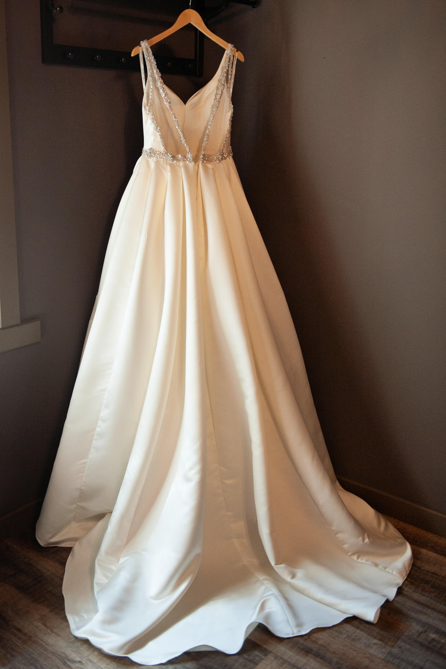 Bride's gown before her Creekside Villa wedding captured by Tara Whittaker Photography