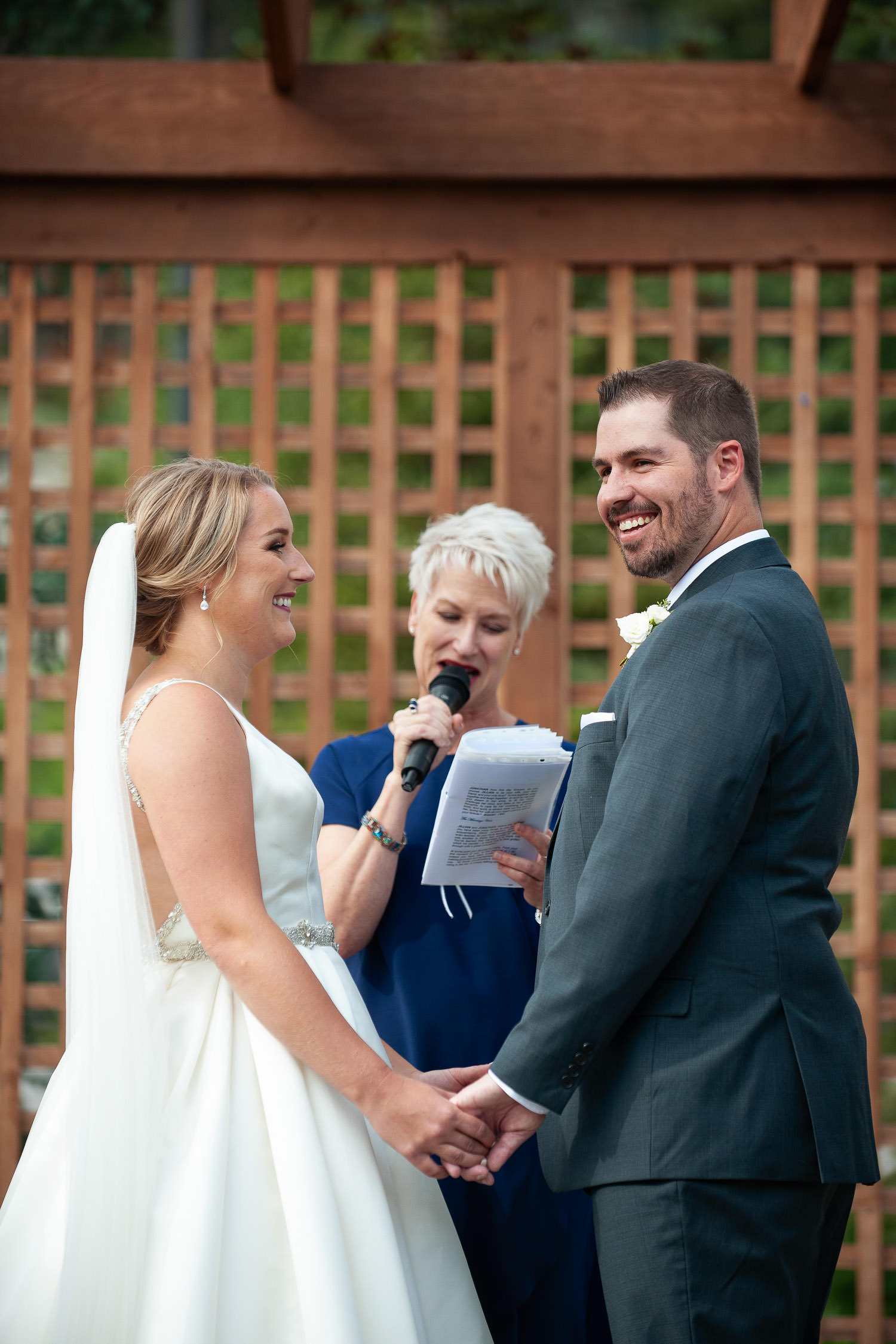 Wedding ceremony at Creekside Villa in Canmore captured by Tara Whittaker Photography