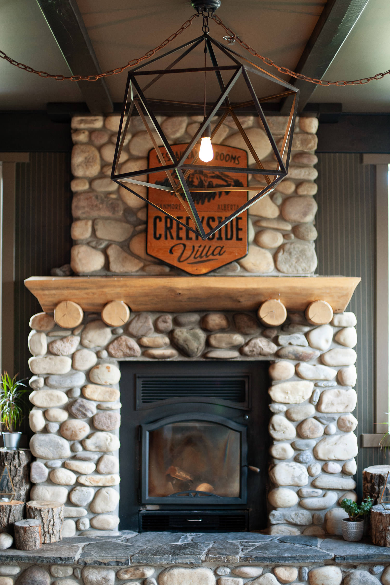 Rustic fireplace at Creekside Villa captured by Tara Whittaker Photography