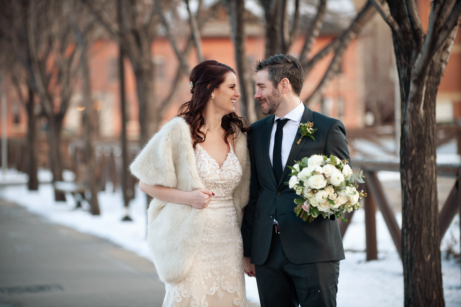 bride and groom on the way to their winter wedding captured by Tara Whittaker Photography