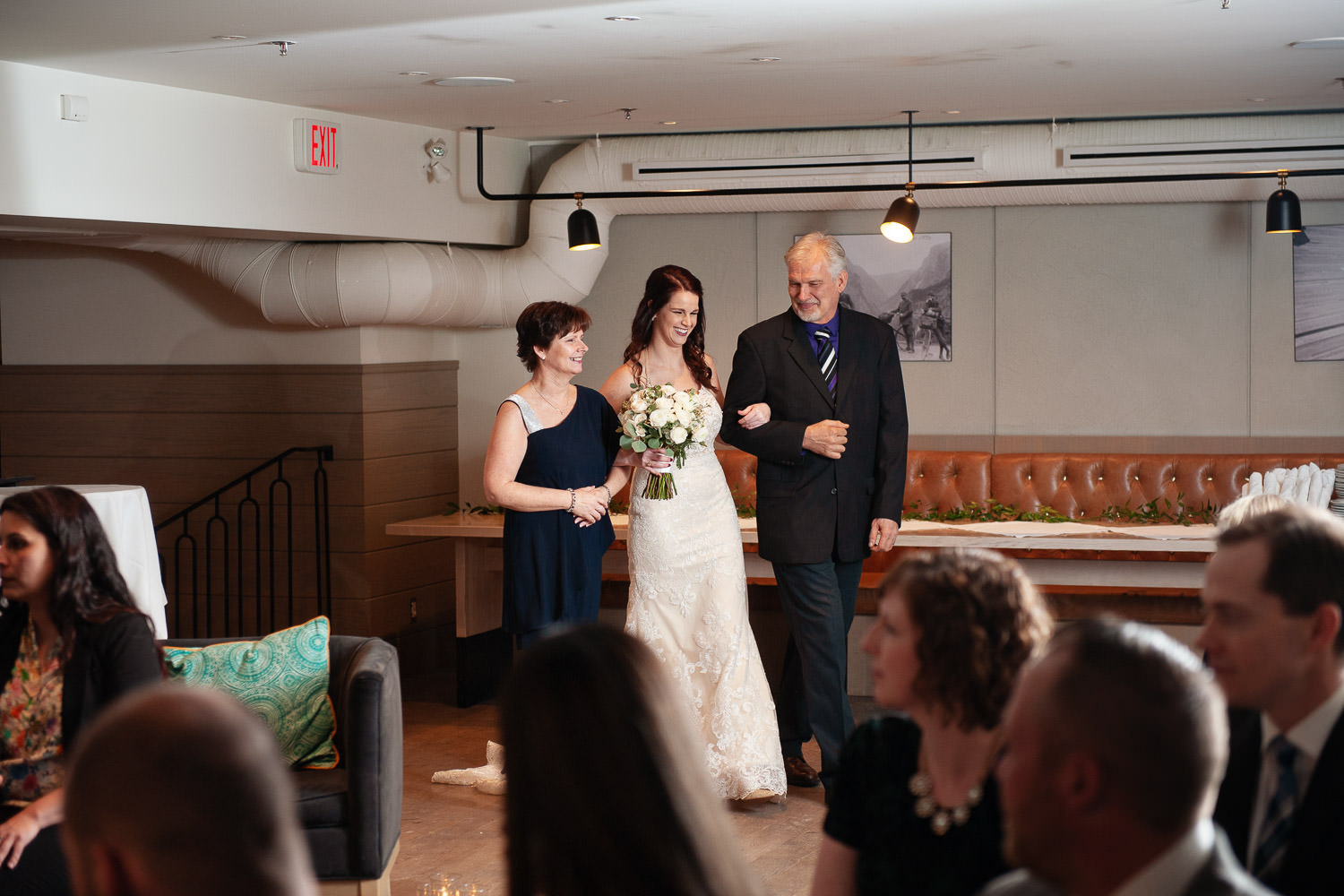 Bride walks down the aisle at her intimate wedding in Calgary captured by Tara Whittaker Photography