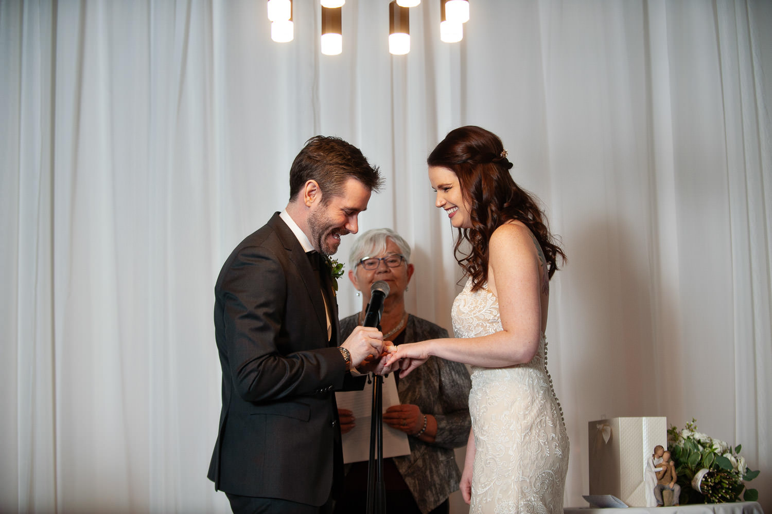 Wedding ceremony at Alforno in Eau Claire captured by Tara Whittaker Photography