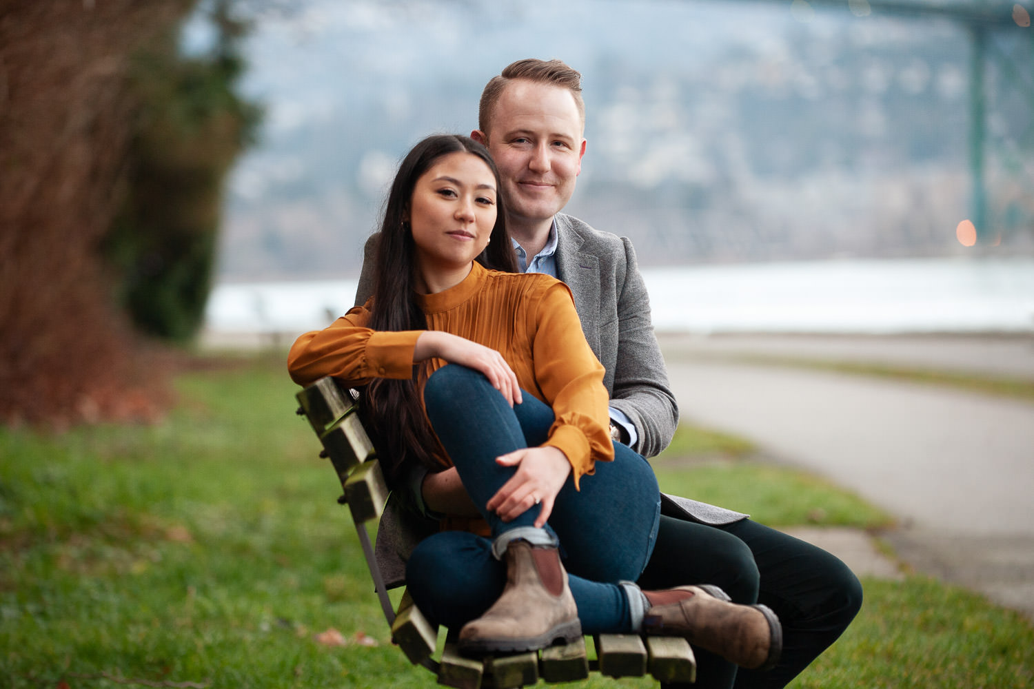couple on sea wall in Stanley Park captured by Tara Whittaker Photography