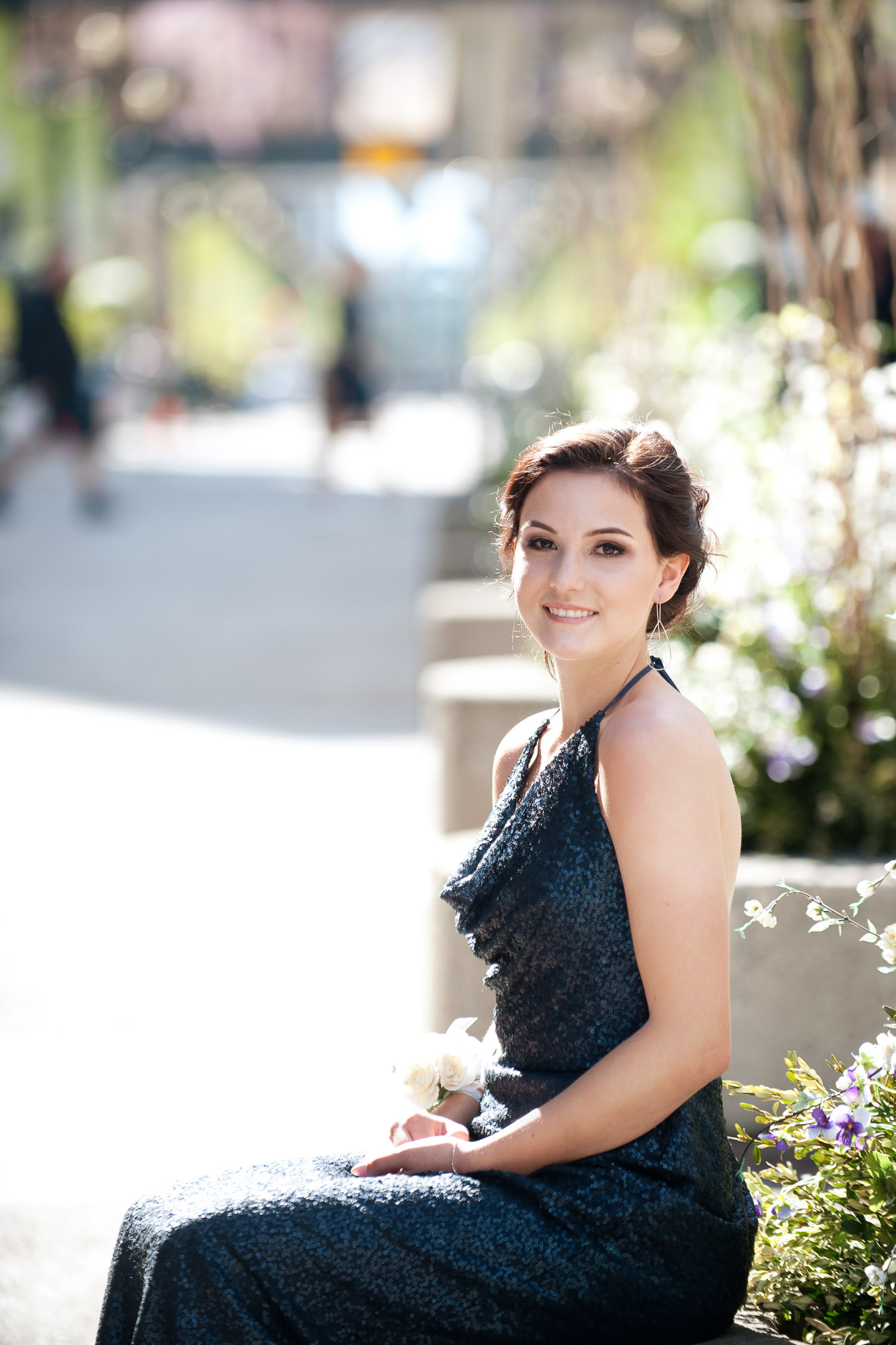 Graduate in her grad dress on Stephen Avenue captured by Tara Whittaker Photography