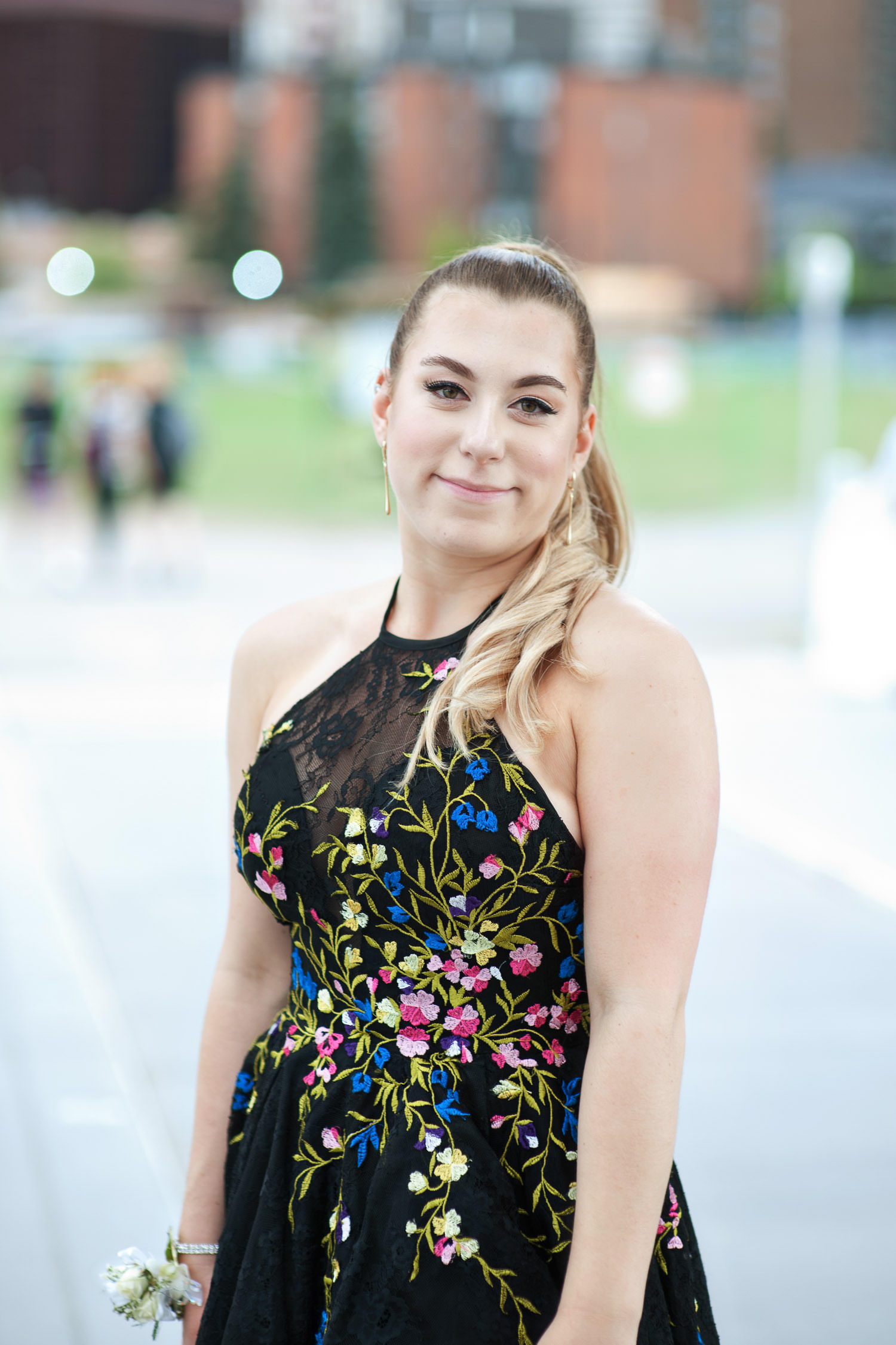 Calgary graduate wearing her halter-style dress captured by Tara Whittaker Photography