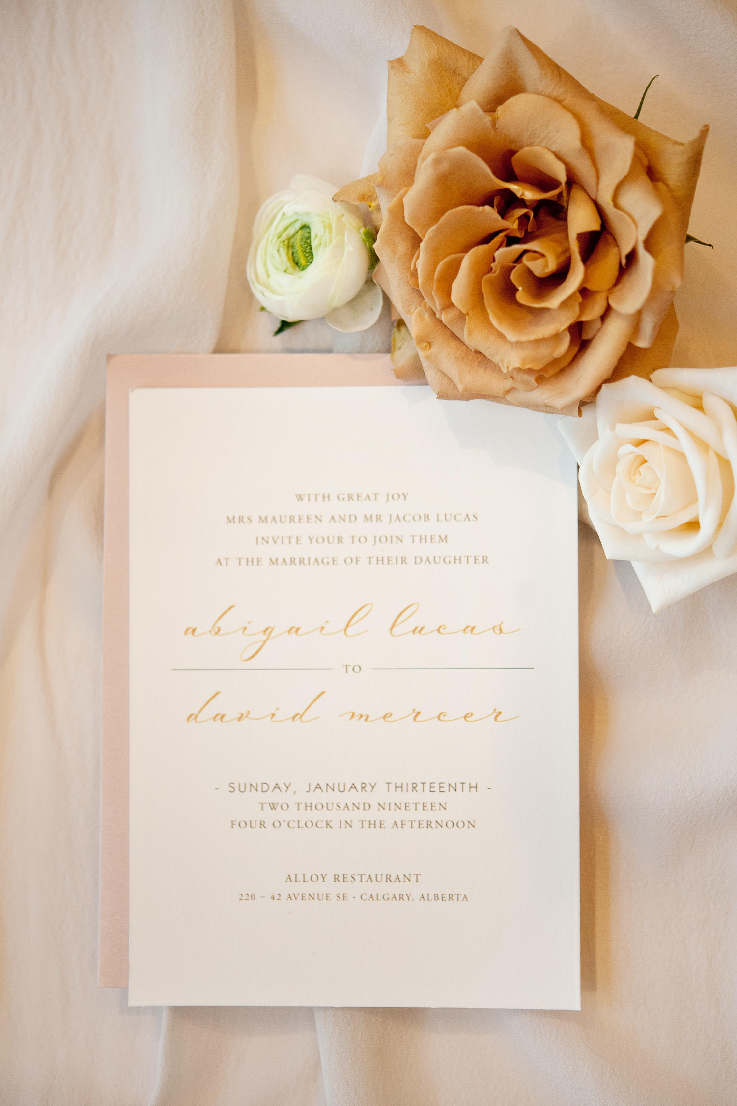 wedding invitation styled with roses captured by Tara Whittaker Photography