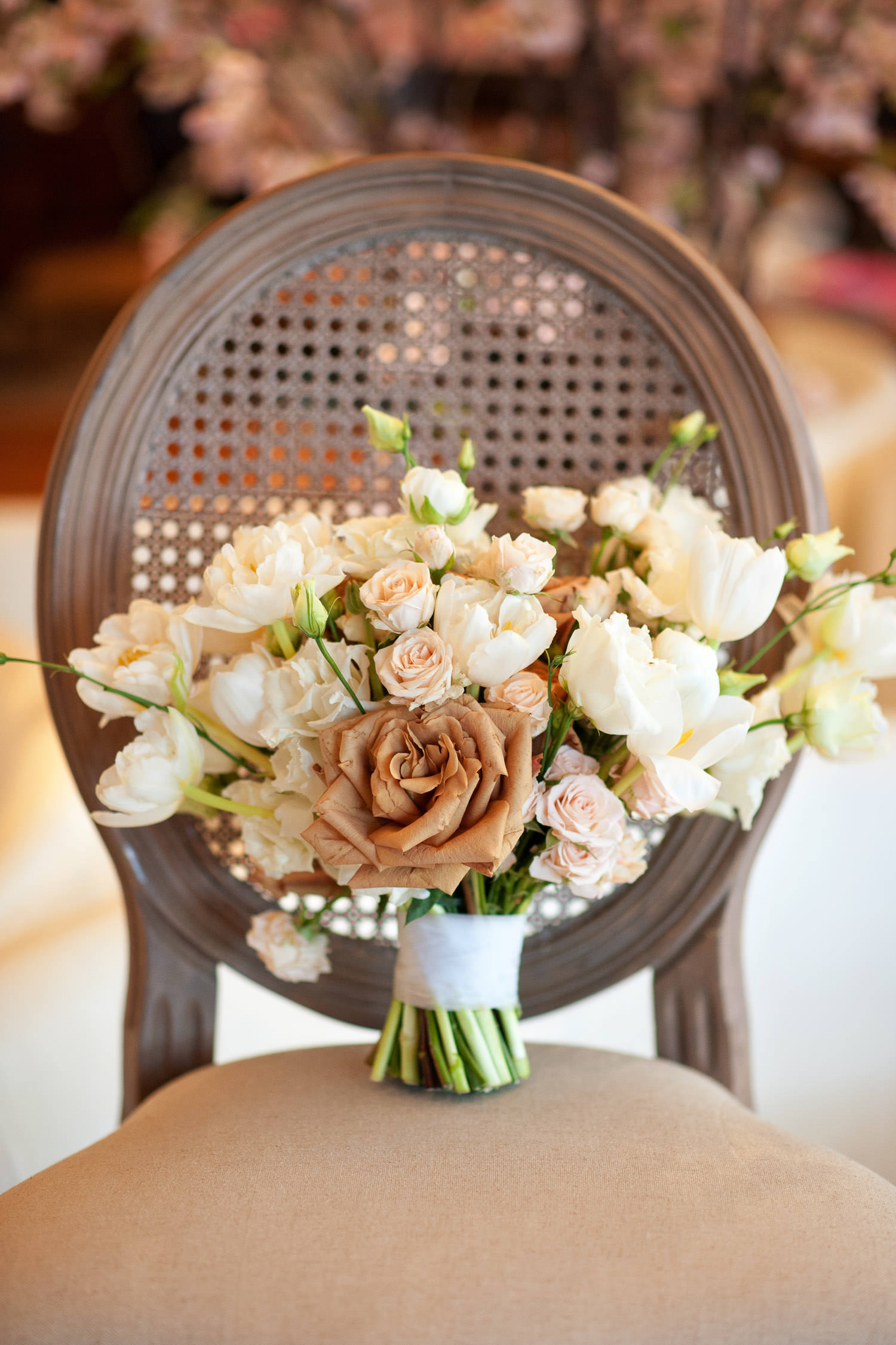 bride's bouquet in caramel, peach and white captured by Tara Whittaker Photography