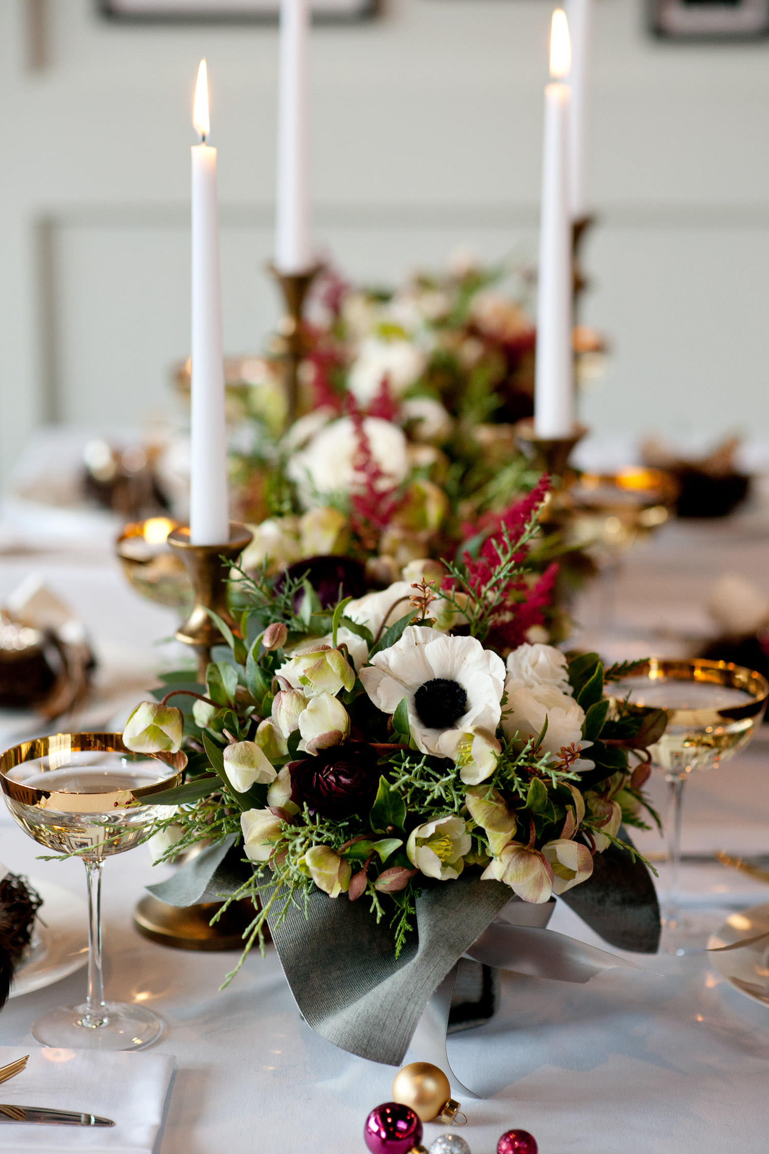 Panda anemones on a holiday table captured by Tara Whittaker Photography