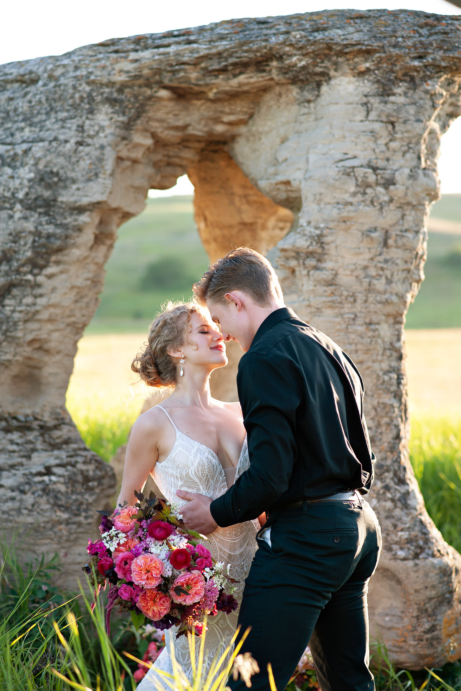 bride and groom kiss at their fall wedding captured by Tara Whittaker Photography