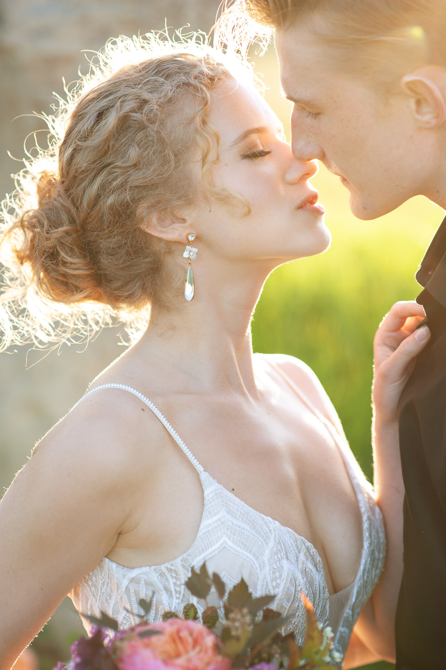 bride and groom kiss during the golden hour captured by Tara Whittaker Photography