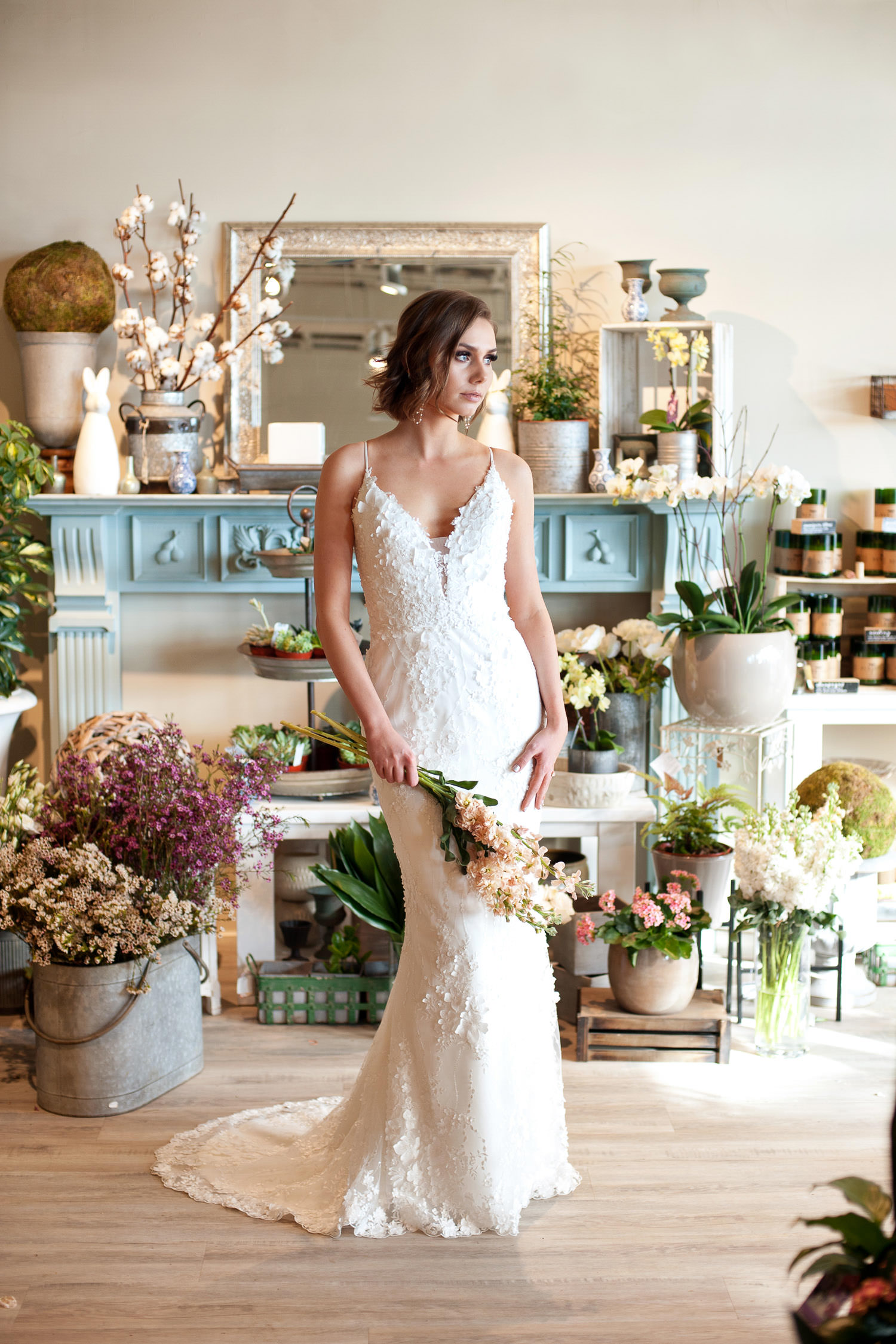bride wears a floral lace gown from Lis Simon captured by Tara Whittaker Photography