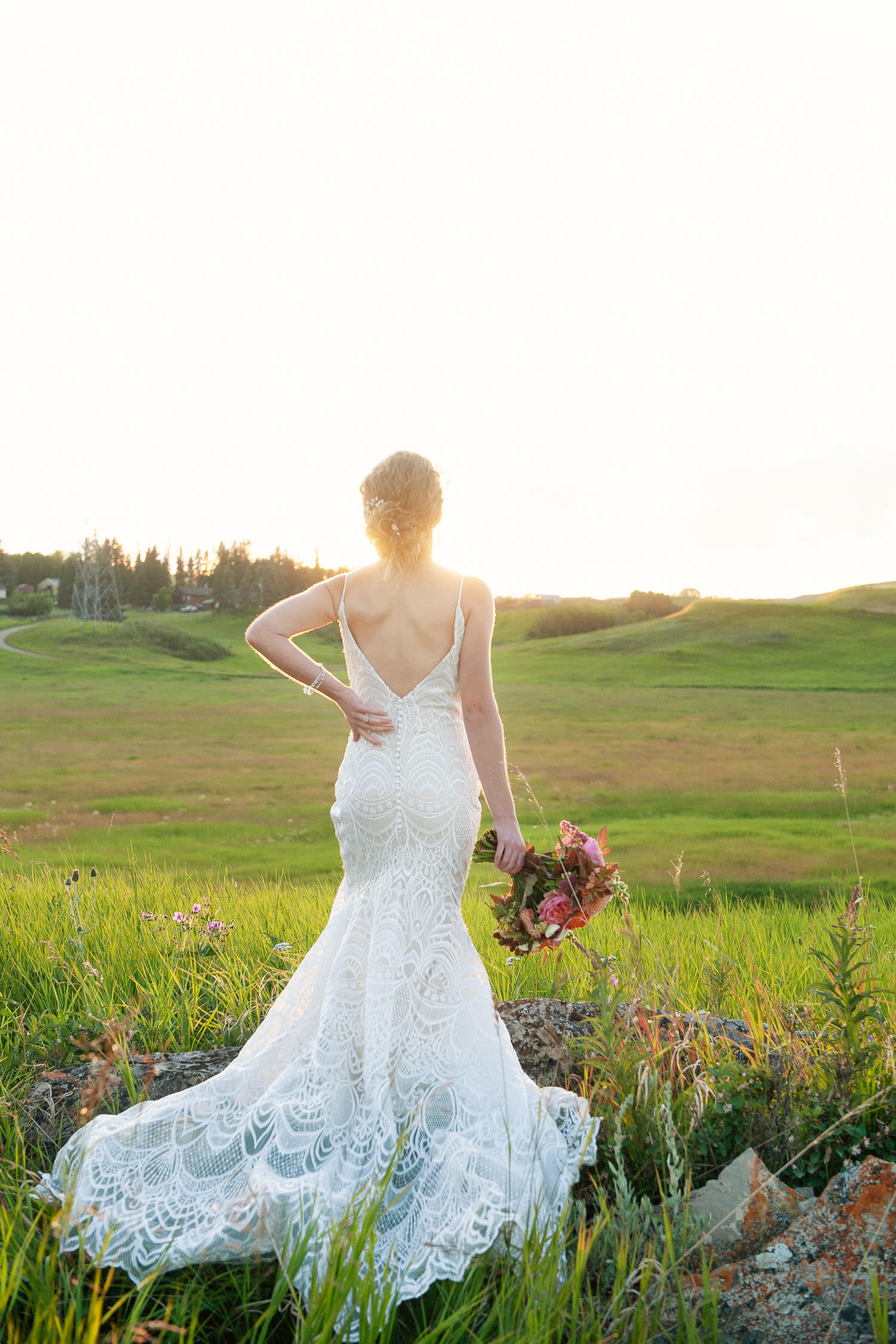 the back of a Lis Simon bridal gown captured by Tara Whittaker Photography