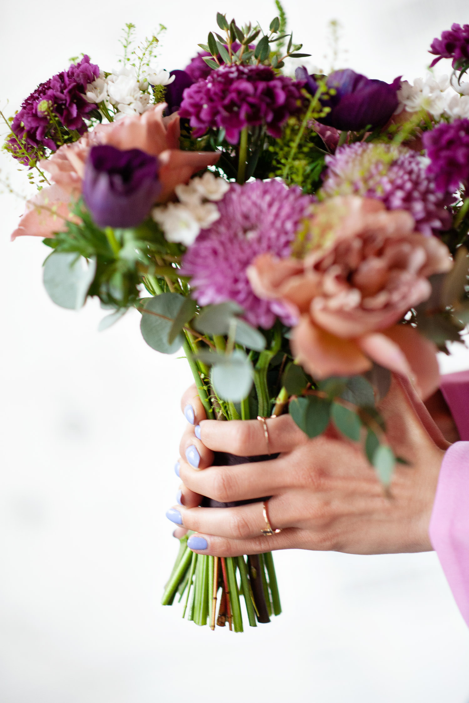 Bridesmaid with lilac-toned nails for a spring wedding captured by Tara Whittaker Photography