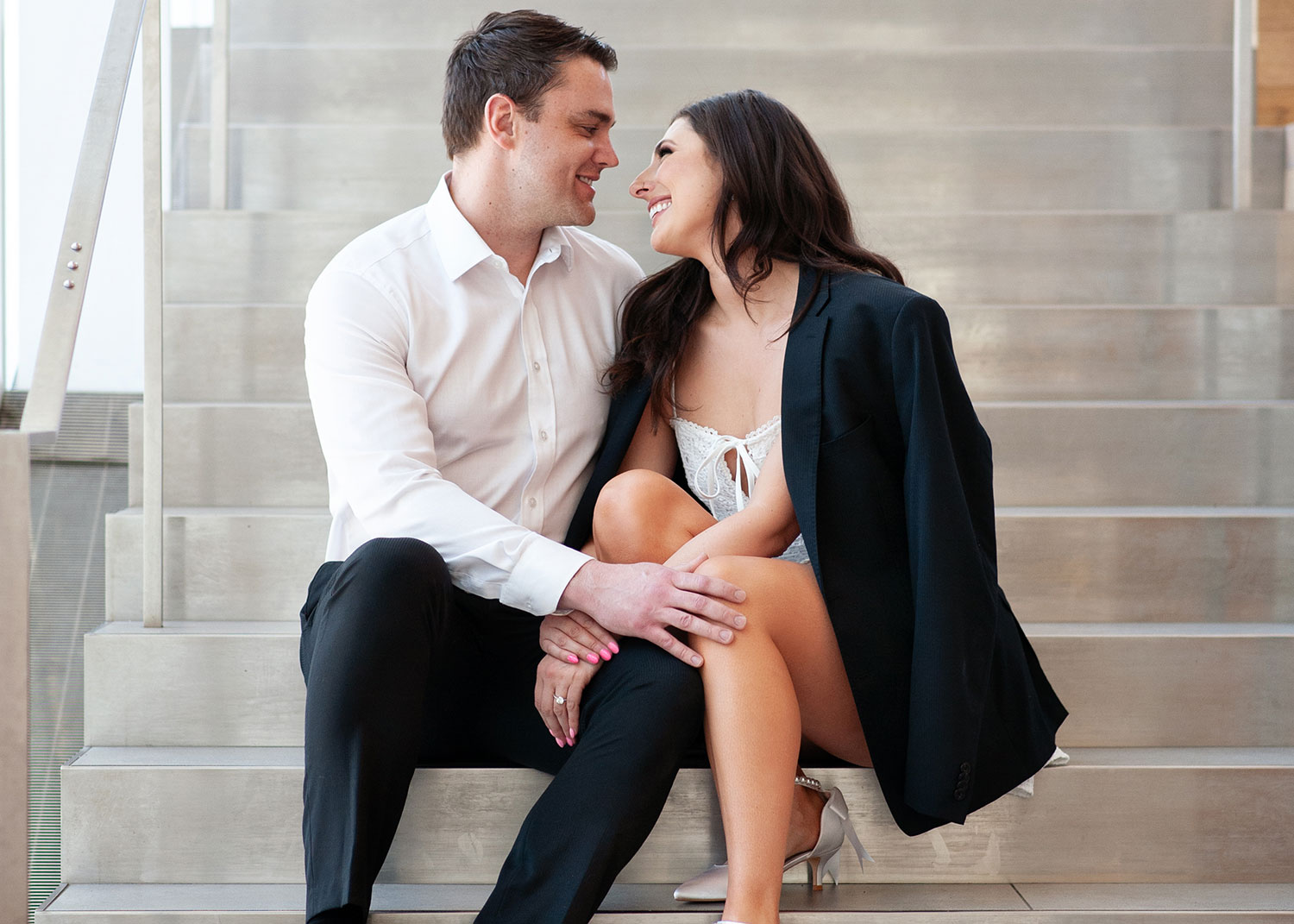 Couple on staircase of Central Library captured by Tara Whittaker Photography