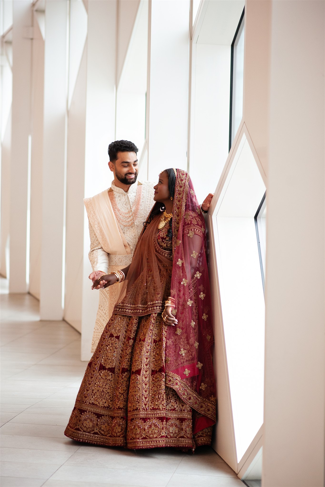 Bride and groom's first look for Indian Fusion Weddings in Calgary captured by Tara Whittaker Photography